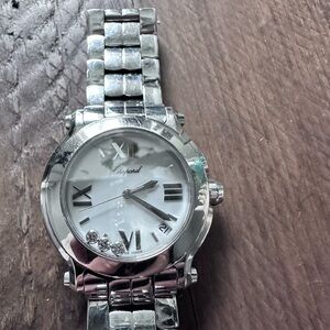 Chopard Happy Sport 3  diamonds woman’s watch. 3 floating diamond’s.